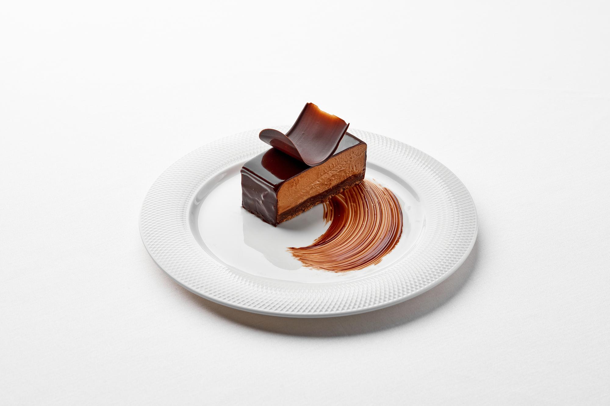 Plated dessert with caramel and garnish